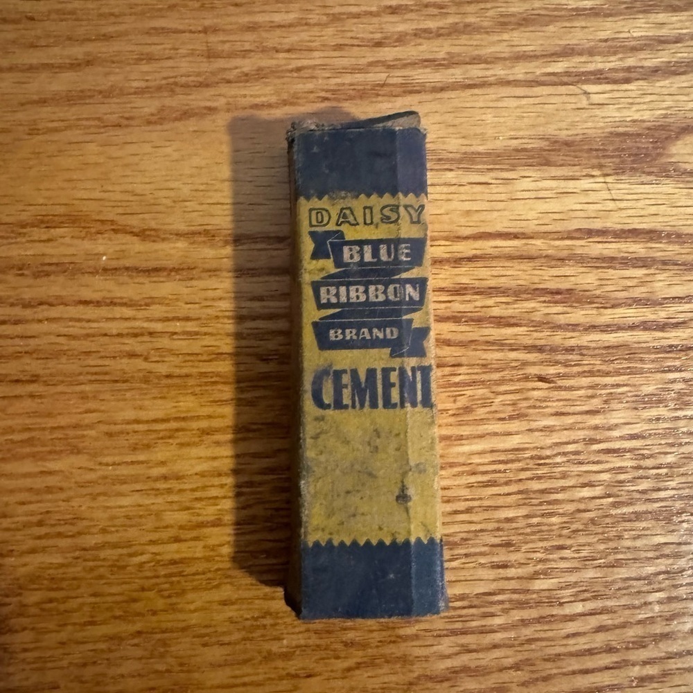 Vintage Antique Shop Auto Construction Daisy Blue Ribbon Brand Cement